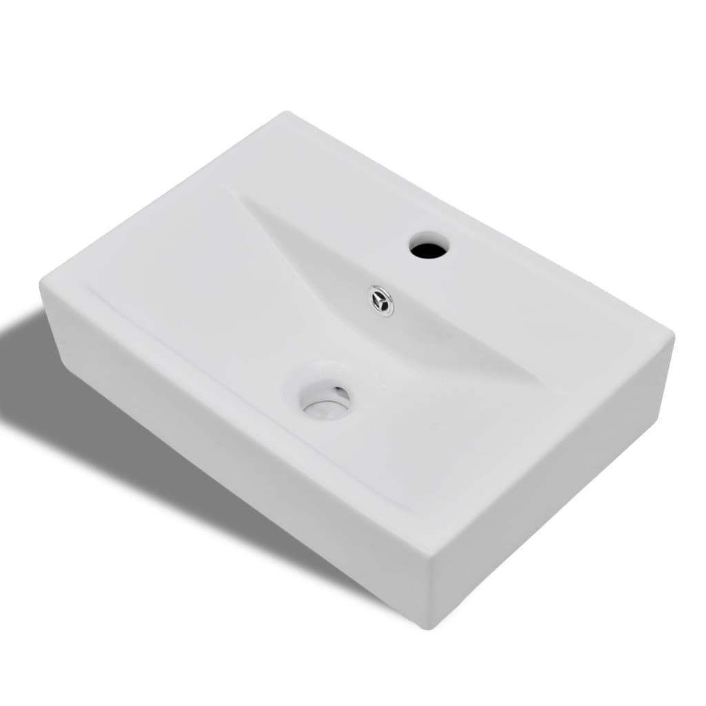 White ceramic rectangular bathroom sink with tap/overflow