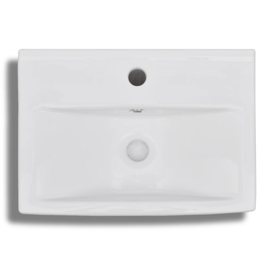 White ceramic rectangular bathroom sink with tap/overflow